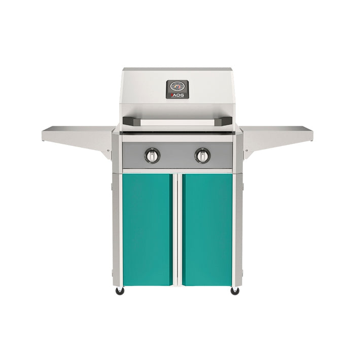 American Outdoor Grill 24" T-Series Portable Gas Grill with gray accent panel and teal accent panel cart base, large analog thermometer and push-button electronic ignition with backlit comfort-touch control knobs.
