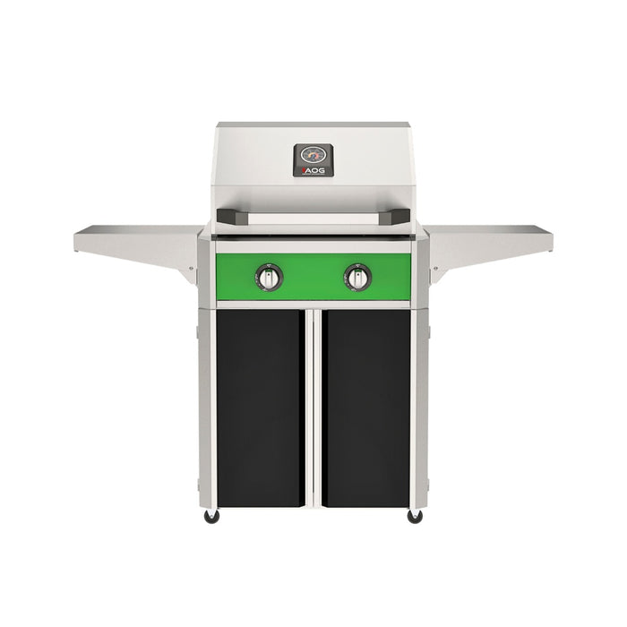 American Outdoor Grill 24" T-Series Portable Gas Grill with green accent panel and black accent panel cart base, large analog thermometer and push-button electronic ignition with backlit comfort-touch control knobs.
