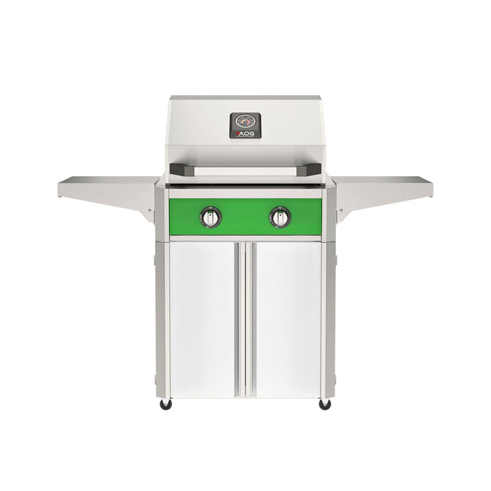 American Outdoor Grill 24" T-Series Portable Gas Grill with green accent panel and white accent panel cart base, large analog thermometer and push-button electronic ignition with backlit comfort-touch control knobs.
