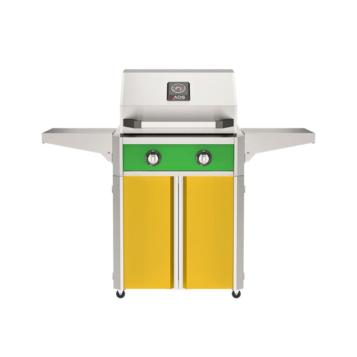 American Outdoor Grill 24" T-Series Portable Gas Grill with green accent panel and yellow accent panel cart base, large analog thermometer and push-button electronic ignition with backlit comfort-touch control knobs.
