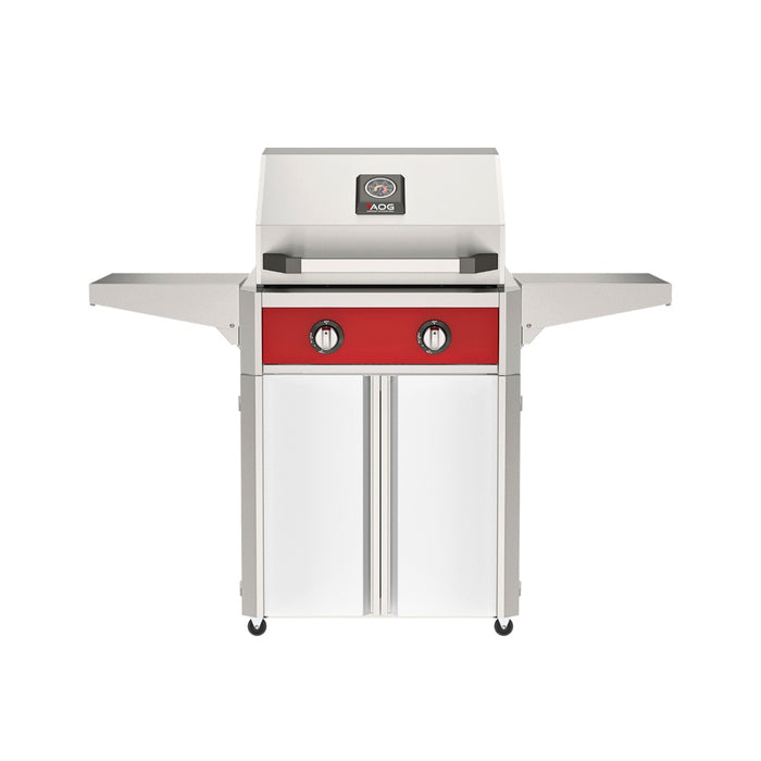 American Outdoor Grill 24" T-Series Portable Gas Grill with red accent panel and white accent panel cart base, large analog thermometer and push-button electronic ignition with backlit comfort-touch control knobs.
