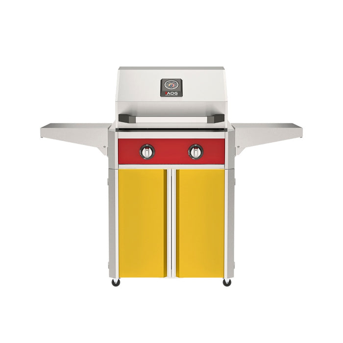 American Outdoor Grill 24" T-Series Portable Gas Grill with red accent panel and yellow accent panel cart base, large analog thermometer and push-button electronic ignition with backlit comfort-touch control knobs.
