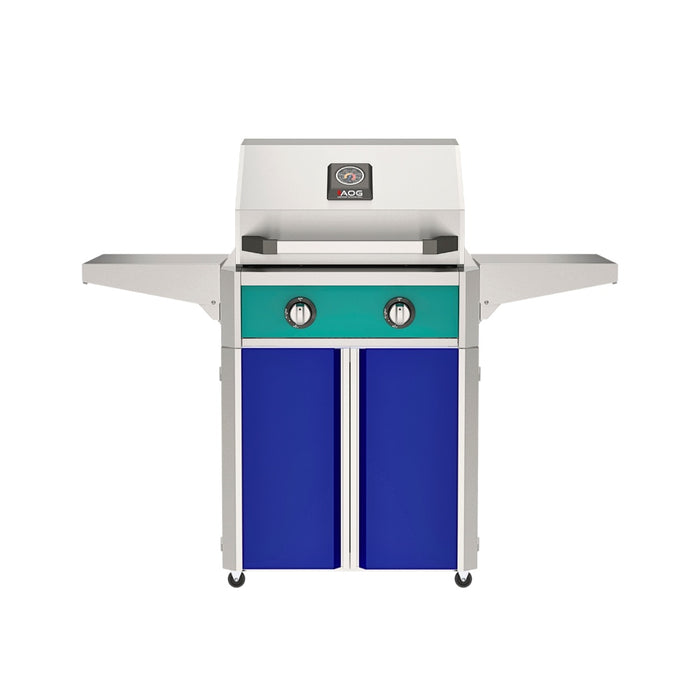 American Outdoor Grill 24" T-Series Portable Gas Grill with teal accent panel and blue accent panel cart base, large analog thermometer and push-button electronic ignition with backlit comfort-touch control knobs.
