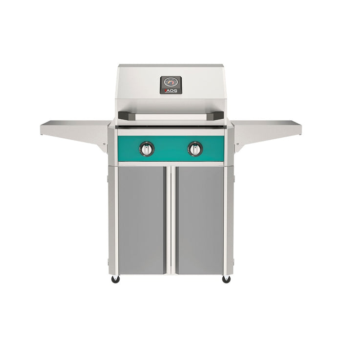 American Outdoor Grill 24" T-Series Portable Gas Grill with teal accent panel and gray accent panel cart base, large analog thermometer and push-button electronic ignition with backlit comfort-touch control knobs.
