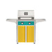 American Outdoor Grill 24" T-Series Portable Gas Grill with teal accent panel and yellow accent panel cart base, large analog thermometer and push-button electronic ignition with backlit comfort-touch control knobs.

