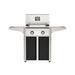 American Outdoor Grill 24" T-Series Portable Gas Grill with white accent panel and black accent panel cart base, large analog thermometer and push-button electronic ignition with backlit comfort-touch control knobs.

