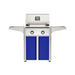 American Outdoor Grill 24" T-Series Portable Gas Grill with white accent panel and blue accent panel cart base, large analog thermometer and push-button electronic ignition with backlit comfort-touch control knobs.
