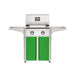 American Outdoor Grill 24" T-Series Portable Gas Grill with white accent panel and green accent panel cart base, large analog thermometer and push-button electronic ignition with backlit comfort-touch control knobs.

