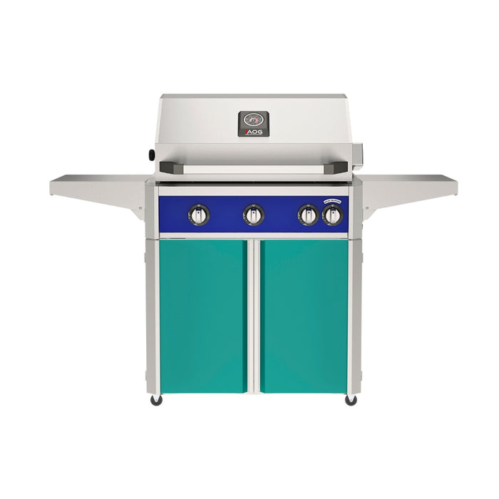 American Outdoor Grill 30" L-Series Portable Gas Grill with blue accent panel and teal accent panel cart base, large analog thermometer and push-button electronic ignition with backlit comfort-touch control knobs.
