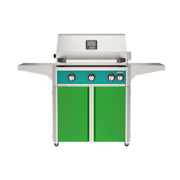 American Outdoor Grill 30" L-Series Portable Gas Grill with teal accent and green accent panel cart base, large analog thermometer and push-button electronic ignition with backlit comfort-touch control knobs.

