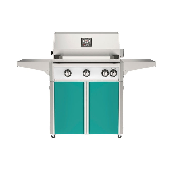 American Outdoor Grill 30" L-Series Portable Gas Grill with white accent panel and teal accent panel cart base, large analog thermometer and push-button electronic ignition with backlit comfort-touch control knobs.
