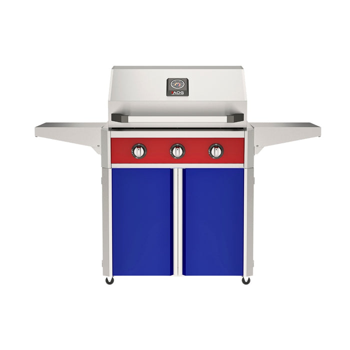 American Outdoor Grill 30" T-Series Portable Gas Grill with red accent panel and blue accent panel cart base, large analog thermometer and push-button electronic ignition with backlit comfort-touch control knobs.
