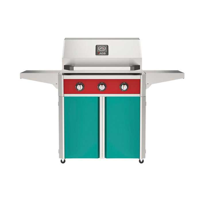 American Outdoor Grill 30" T-Series Portable Gas Grill with red accent panel and teal accent panel cart base, large analog thermometer and push-button electronic ignition with backlit comfort-touch control knobs.
