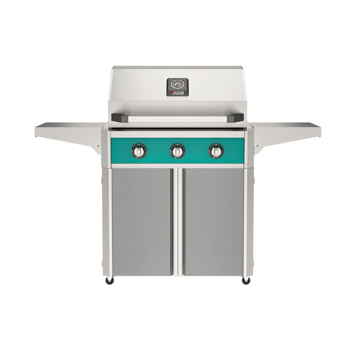American Outdoor Grill 30" T-Series Portable Gas Grill with teal accent panel and gray accent panel cart base, large analog thermometer and push-button electronic ignition with backlit comfort-touch control knobs.

