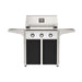 American Outdoor Grill 30" T-Series Portable Gas Grill with white accent panel and black accent panel cart base, large analog thermometer and push-button electronic ignition with backlit comfort-touch control knobs.
