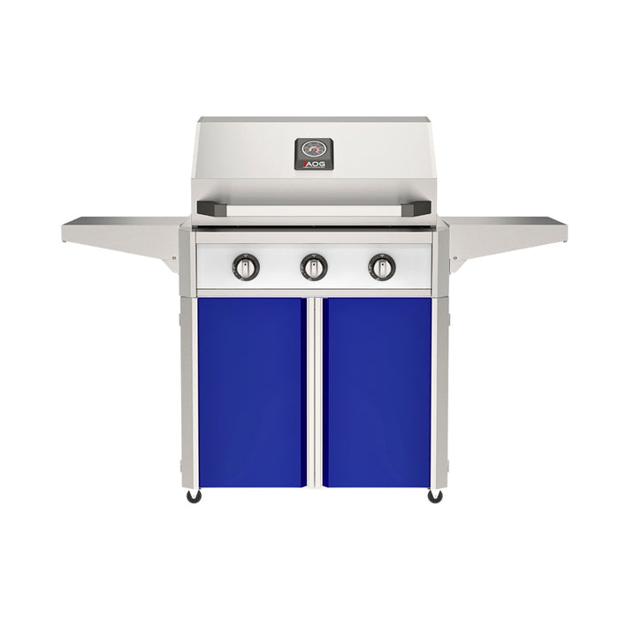 American Outdoor Grill 30" T-Series Portable Gas Grill with white accent panel and blue accent panel cart base, large analog thermometer and push-button electronic ignition with backlit comfort-touch control knobs.
