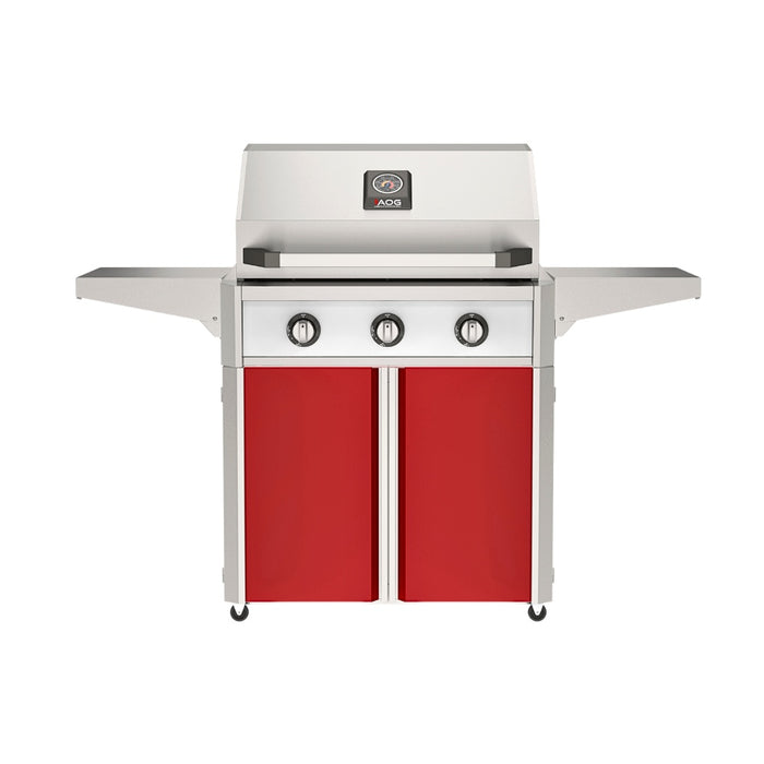 American Outdoor Grill 30" T-Series Portable Gas Grill with white accent panel and red accent panel cart base, large analog thermometer and push-button electronic ignition with backlit comfort-touch control knobs.
