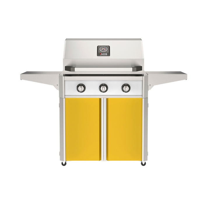 American Outdoor Grill 30" T-Series Portable Gas Grill with white accent panel and yellow accent panel cart base, large analog thermometer and push-button electronic ignition with backlit comfort-touch control knobs.
