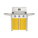 American Outdoor Grill 30" T-Series Portable Gas Grill with white accent panel and yellow accent panel cart base, large analog thermometer and push-button electronic ignition with backlit comfort-touch control knobs.
