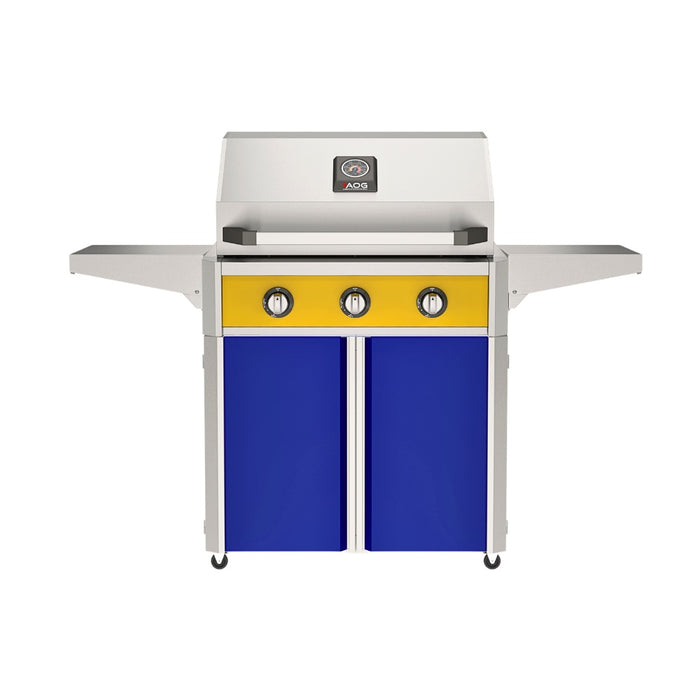 American Outdoor Grill 30" T-Series Portable Gas Grill with yellow accent panel and blue accent panel cart base, large analog thermometer and push-button electronic ignition with backlit comfort-touch control knobs.
