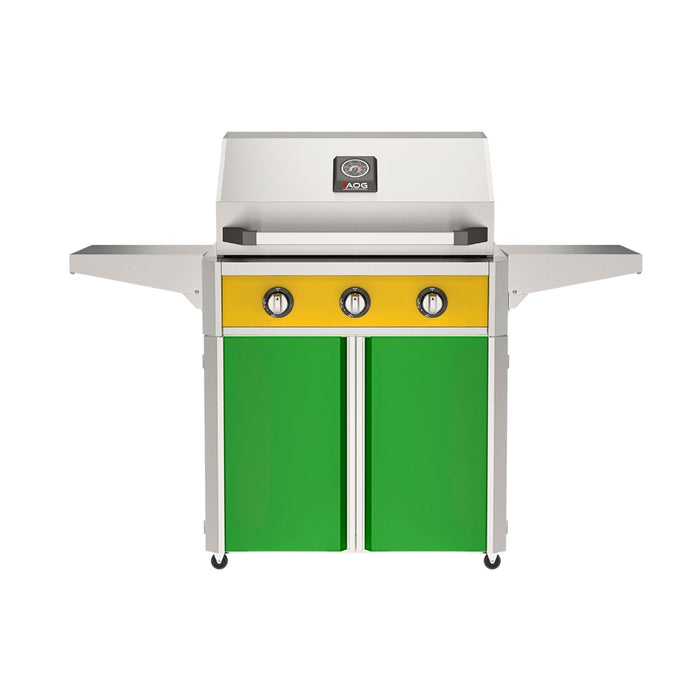 American Outdoor Grill 30" T-Series Portable Gas Grill with yellow accent panel and green accent panel cart base, large analog thermometer and push-button electronic ignition with backlit comfort-touch control knobs.
