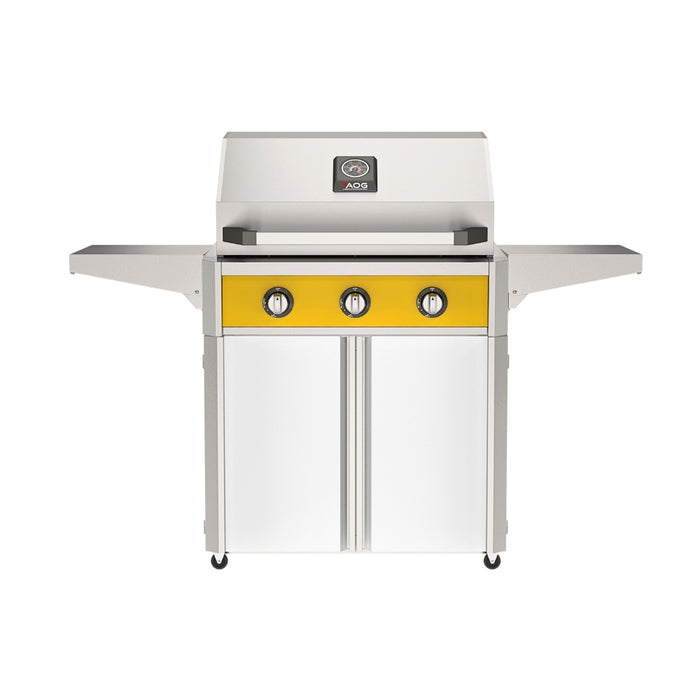 American Outdoor Grill 30" T-Series Portable Gas Grill with yellow accent panel and white accent panel cart base, large analog thermometer and push-button electronic ignition with backlit comfort-touch control knobs.
