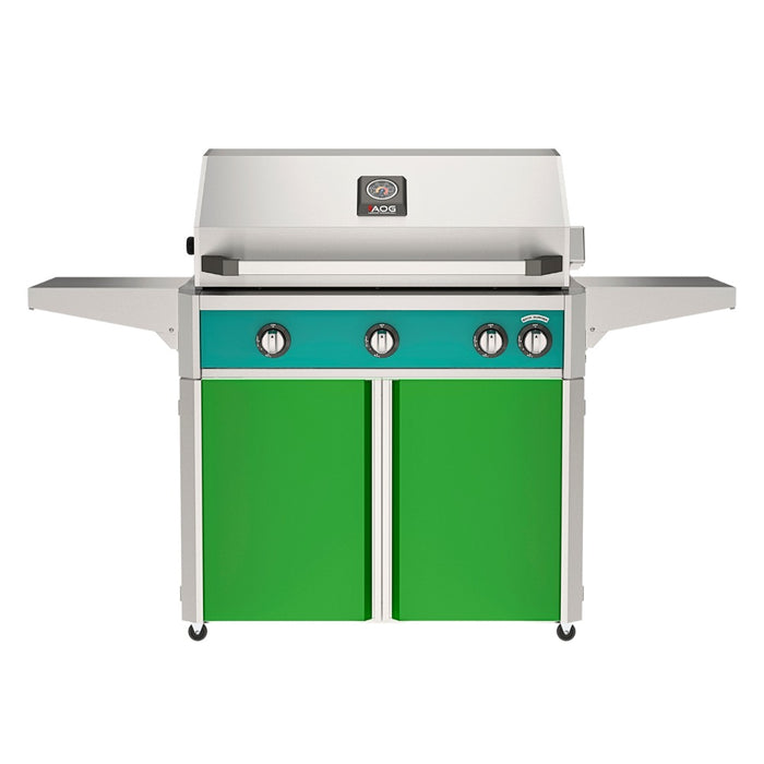American Outdoor Grill 36" L-Series Portable Gas Grill with teal accent panel and green accent panel cart base, large analog thermometer and push-button electronic ignition with backlit comfort-touch control knobs.
