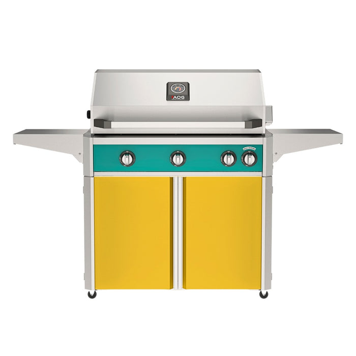 American Outdoor Grill 36" L-Series Portable Gas Grill with teal accent panel and yellow accent panel cart base, large analog thermometer and push-button electronic ignition with backlit comfort-touch control knobs.
