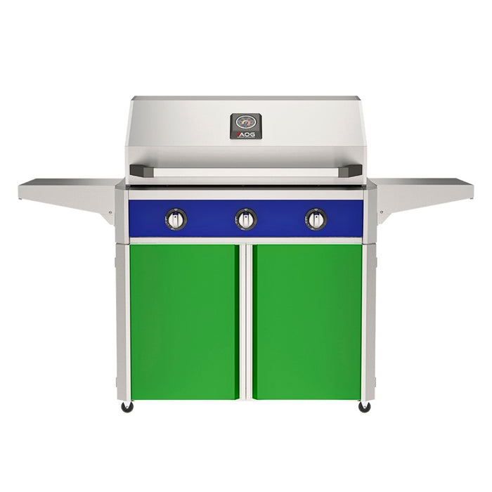 American Outdoor Grill 36" T-Series Portable Gas Grill with blue accent panel and green accent panel cart base, large analog thermometer and push-button electronic ignition with backlit comfort-touch control knobs.
