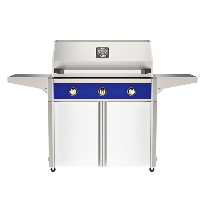 American Outdoor Grill 36" T-Series Portable Gas Grill with blue accent panel and white accent panel cart base, large analog thermometer and push-button electronic ignition with backlit comfort-touch control knobs.
