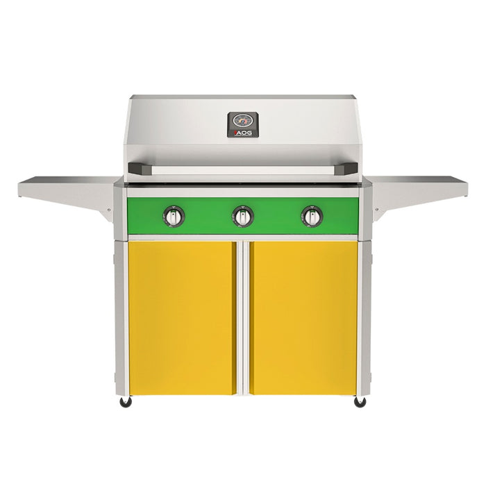 American Outdoor Grill 36" T-Series Portable Gas Grill with green accent panel and yellow accent panel cart base, large analog thermometer and push-button electronic ignition with backlit comfort-touch control knobs.
