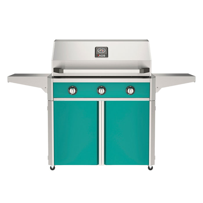 American Outdoor Grill 36" T-Series Portable Gas Grill with teal accent panel and teal accent panel cart base, large analog thermometer and push-button electronic ignition with backlit comfort-touch control knobs.

