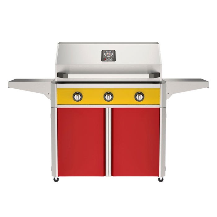 American Outdoor Grill 36" T-Series Portable Gas Grill with yellow accent panel and red accent panel cart base, large analog thermometer and push-button electronic ignition with backlit comfort-touch control knobs.
