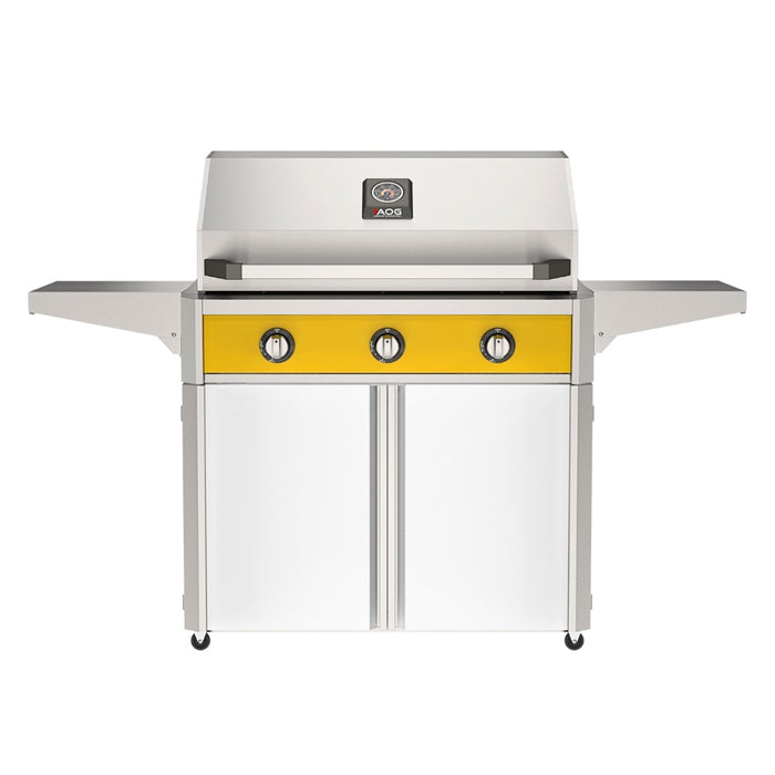 American Outdoor Grill 36" T-Series Portable Gas Grill with yellow accent panel and white accent panel cart base, large analog thermometer and push-button electronic ignition with backlit comfort-touch control knobs.
