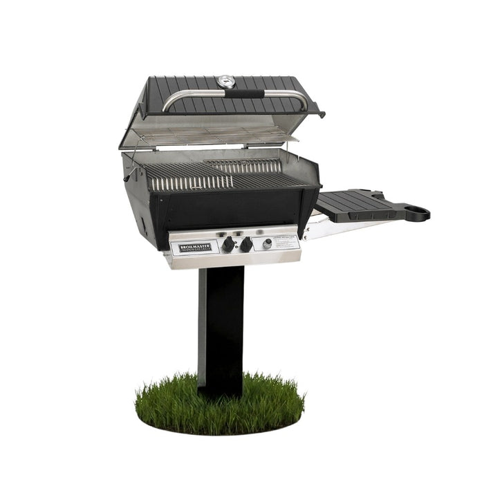 Broilmaster P3X Super Premium Cast Aluminum Gas Grill Head with black solid surface side shelf and painted steel 48" in-ground post.
