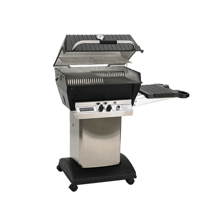 Broilmaster P3XF Super Premium Cast Aluminum Gas Grill Head with black solid surface side shelf and stainless cart base.
