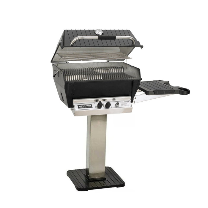 Broilmaster P3XF Super Premium Cast Aluminum Gas Grill Head with black solid surface side shelf and stainless steel 26" patio post.
