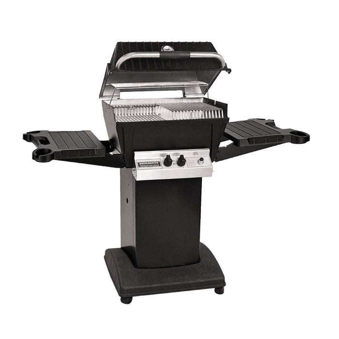 Broilmaster P4XF Super Premium Cast Aluminum Gas Grill Head with black solid surface side shelves and black cart base.
