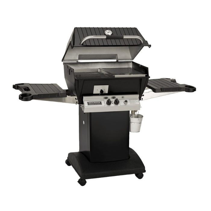 Broilmaster Q3X Gas Slow Cooker / Smoker Head with black solid surface side shelves and black cart base.
