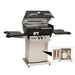 Broilmaster Q3X Gas Slow Cooker / Smoker Head with black solid surface side shelves and stainless storage cart base.
