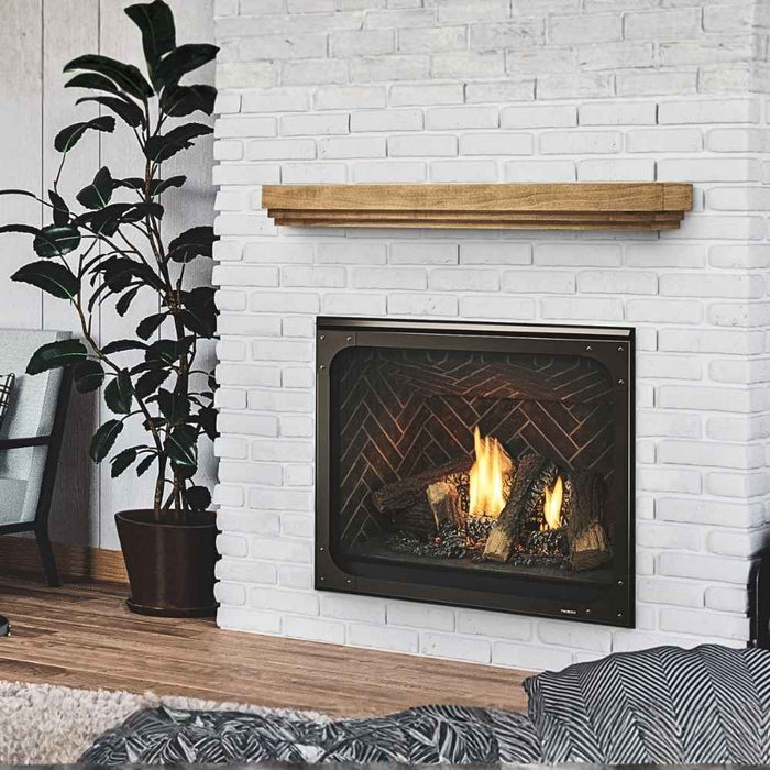 Fireside finishings Crosby Provincial Wood Mantel Shelf installed above a gas fireplace in a inviting living room.