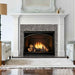 Fireside Finishings Laurel Ebony installed above a gas fireplace in an inviting guess room.