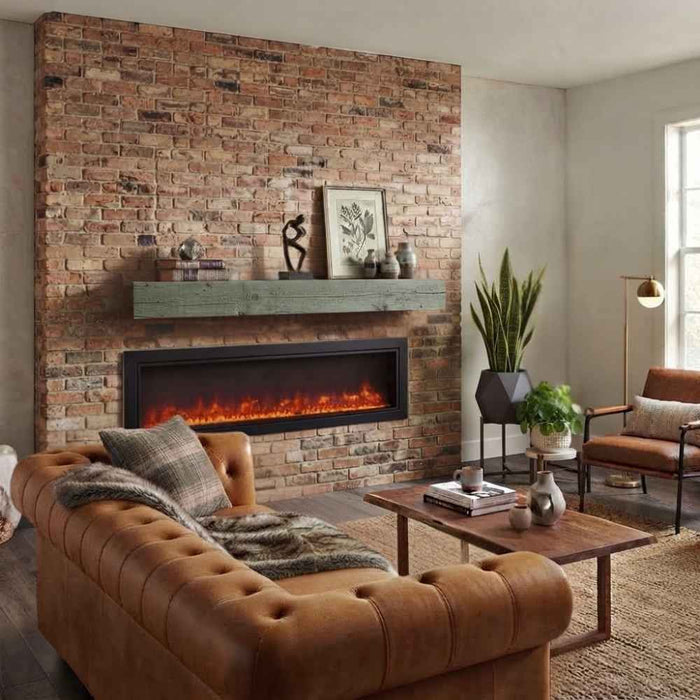 Fireside finishings washed cedar traditional non-combustible mantel shelf installed above a linear electric fireplace on a brick wall in a rustic modern living room.