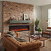 Fireside finishings washed cedar traditional non-combustible mantel shelf installed above a linear electric fireplace on a brick wall in a rustic modern living room.
