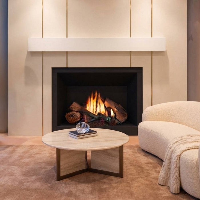 Fireside finishings white modern non-combustible mantel shelf installed above a gas fireplace in a living room.