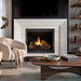 Modern gas fireplace with white marble surround and zimmer flush wood mantel installed in a contemporary living room.