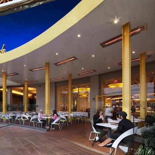 Infratech WD-series electric patio heater integrated into the curved overhead canopy of a modern restaurant outdoor dining patio.