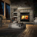 Osburn Stratford II high-efficiency wood burning fireplace withwith traditional faceplate and black door overlay in a rustic stacked stone wall 