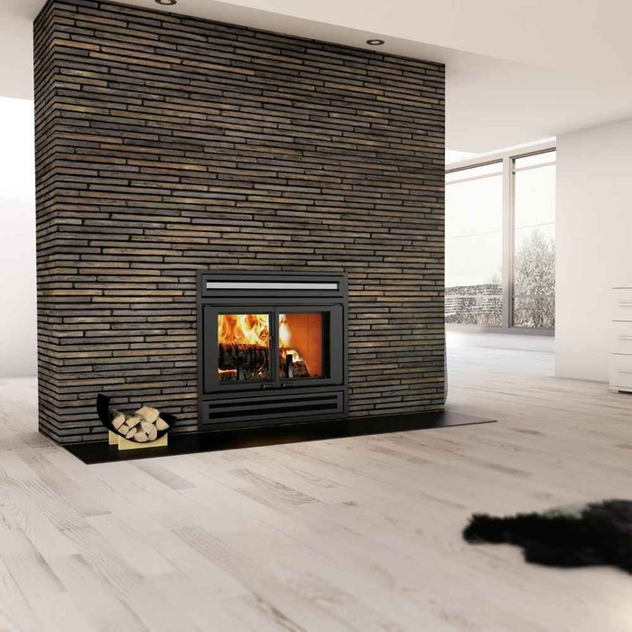 Valcourt Manoir Wood Burning Fireplace installed in a modern living room featuring a double door fireplace hearth embedded into a massive, floor-to-ceiling accent wall