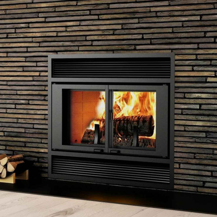 Valcourt Manoir wood burning fireplace with black traditional faceplate installed